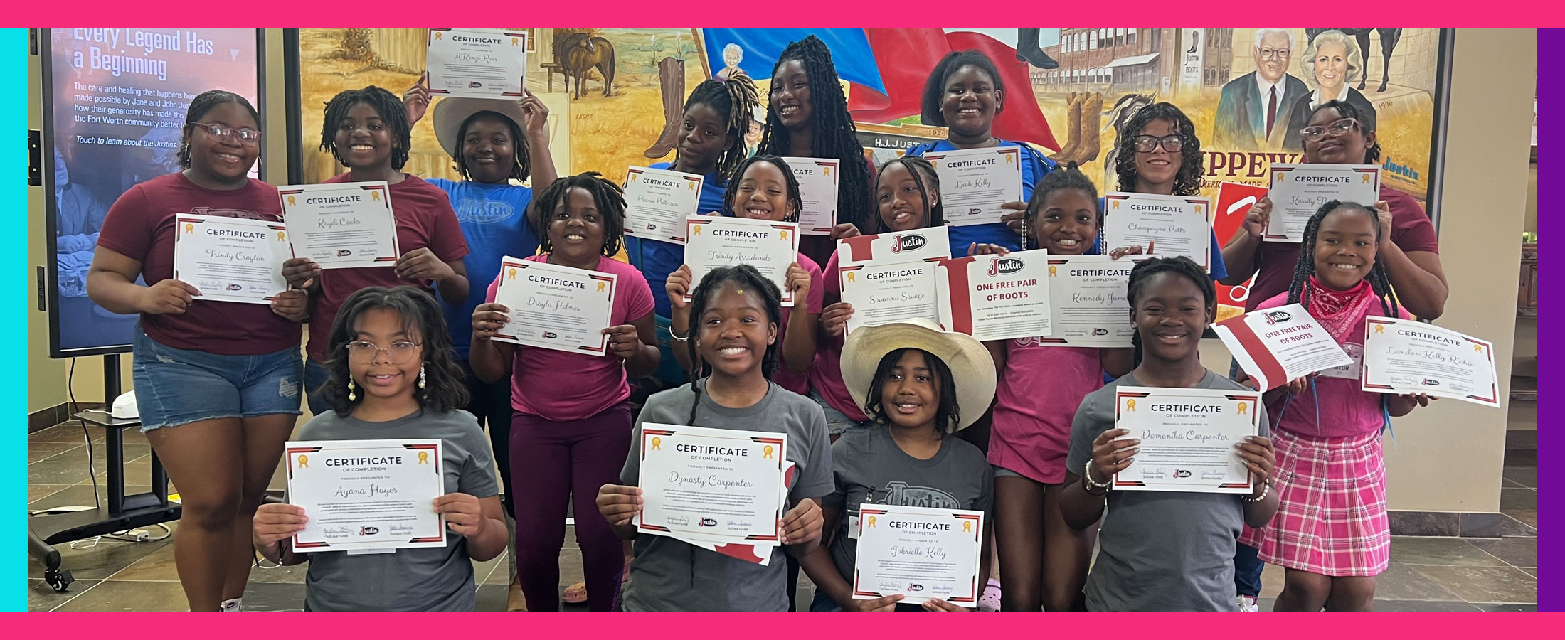 A group photo of teenage girls holding certificates and smiling for the camera.